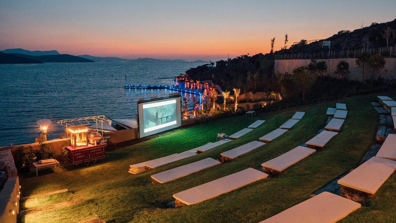 white screen projector by the beach